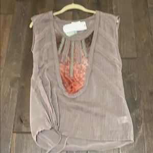 Beautiful blouse with Waste tie.    Stunning